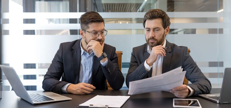 /bynder-asset/bynder:0CFF4FA1-7038-474A-A008968F41D41F3B/Landscape_MD/COLOUR-IMAGE_two-men-looking-over-documents-together-at-desk_jul26.jpg?1782917095000
