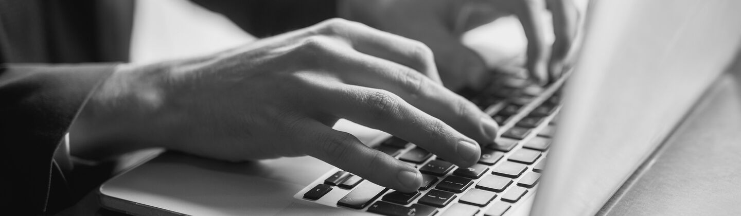 SINGLE-IMAGE_close-up-of-a-hands-of-a-businessman-on-a-keyboard_jul25