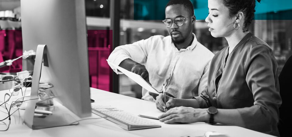 SINGLE-IMAGE_squares-two-employees-man-and-woman-working-with-computer-desktop_apr24
