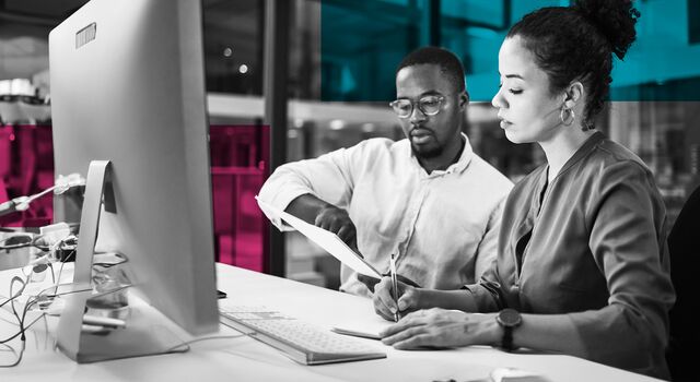 SINGLE-IMAGE_squares-two-employees-man-and-woman-working-with-computer-desktop_apr24