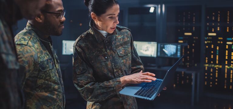 /bynder-asset/bynder:167E34EC-BD87-4DEC-80D73D5739B34E02/Landscape_MD/COLOUR-IMAGE_aerospace%26defence-military-female-and-male-using-laptop_feb26.jpg?1773752927000