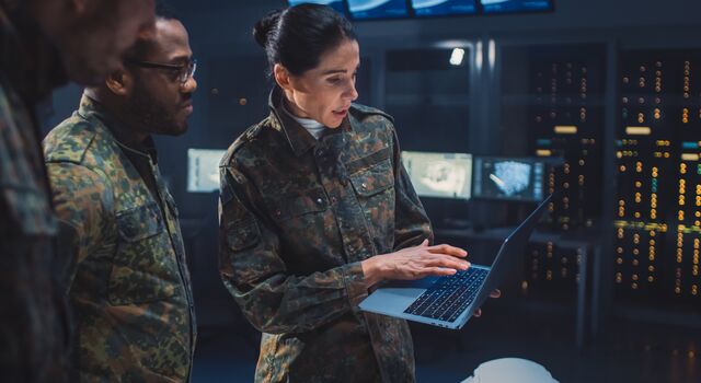 COLOUR-IMAGE_aerospace&defence-military-female-and-male-using-laptop_feb26