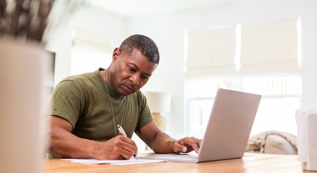 COLOUR-IMAGE_aerospace&defence-military-male-using-laptop-and-paper_feb26