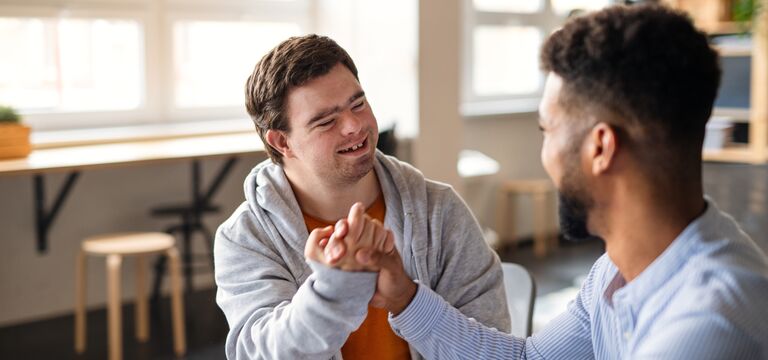 /bynder-asset/bynder:293FBD4F-1675-41AC-B1AE9551F40F06EA/Landscape_MD/COLOUR-IMAGE_NDIS-two-people-handshake.jpeg?1788906332000