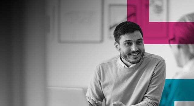 SINGLE-IMAGE_man-talking-to-colleague-with-squares_apr24