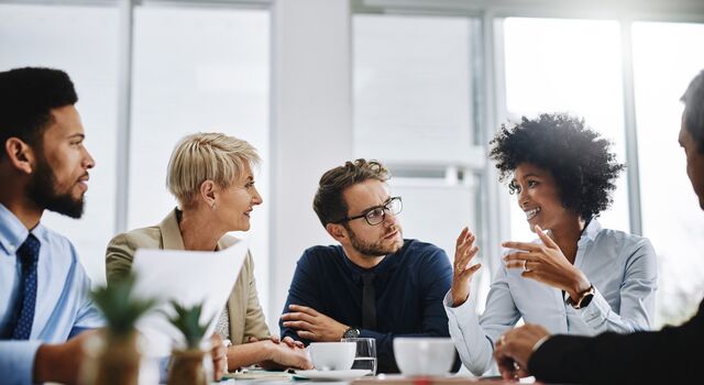 COLOUR-IMAGE_five-professionals-speaking-in-meeting_jul26