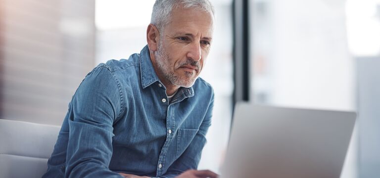 /bynder-asset/bynder:40378414-1289-4DFF-AFDE745C43C228FF/Landscape_MD/COLOUR-IMAGE_businessman_working_laptop_office_july26.jpg?1782911748000