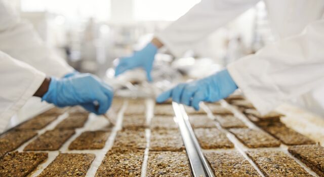 COLOUR-IMAGE_Hands_sorting_bakery_processing_plant_Oct26