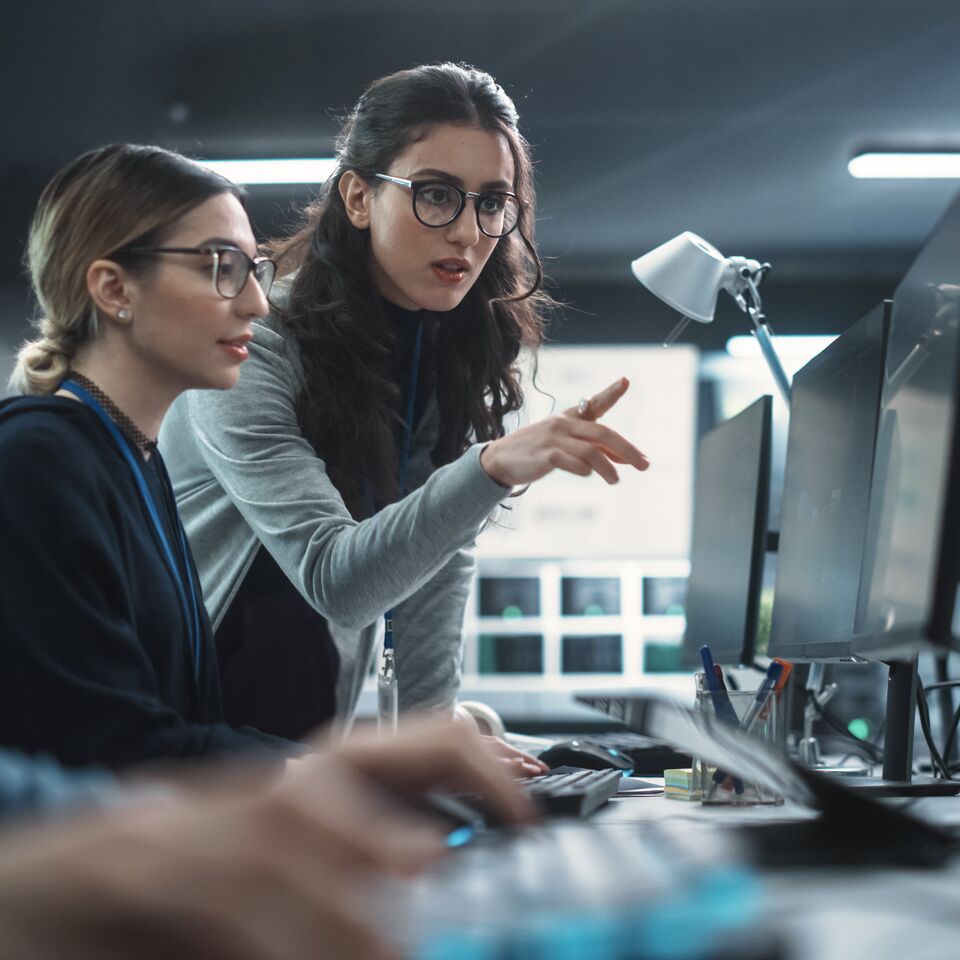 COLOUR-IMAGE_Two-women-working-computers_july26