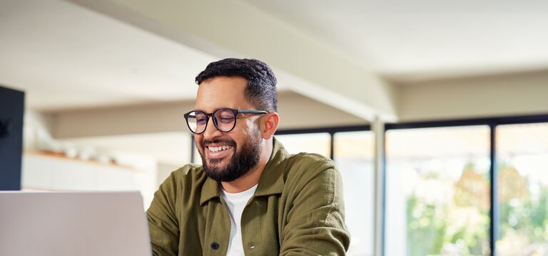 /bynder-asset/bynder:57FC4A05-A8AA-4169-98433CF7CD821E00/Landscape_MD/COLOUR-IMAGE_Man-working-laptop-home_july26.jpg?1782911750000