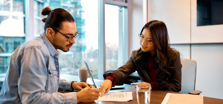 /bynder-asset/bynder:5DC843B2-27EE-44D4-A0361D42164E5676/Landscape_MD/COLOUR-IMAGE_man-and-woman-reading-through-documents_jul26.jpg?1782917093000