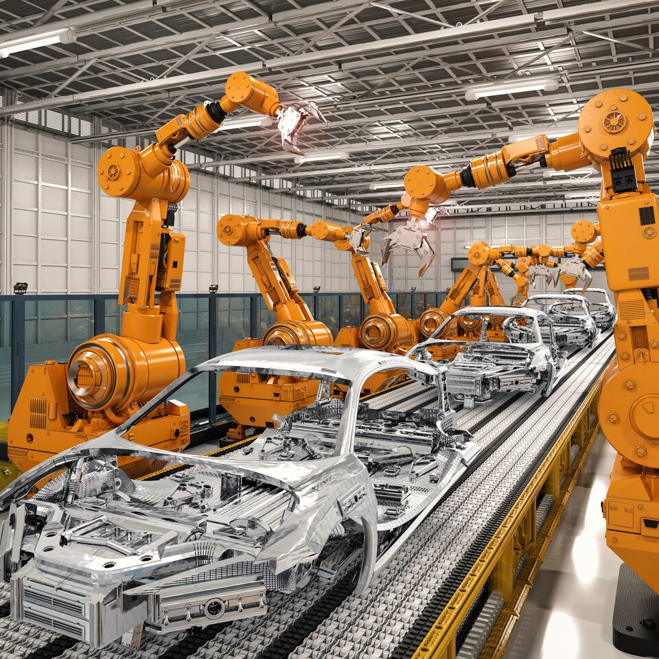 COLOUR-IMAGE_automotive-car-skeleton-on-assemby-line-factory-with-robots_feb26