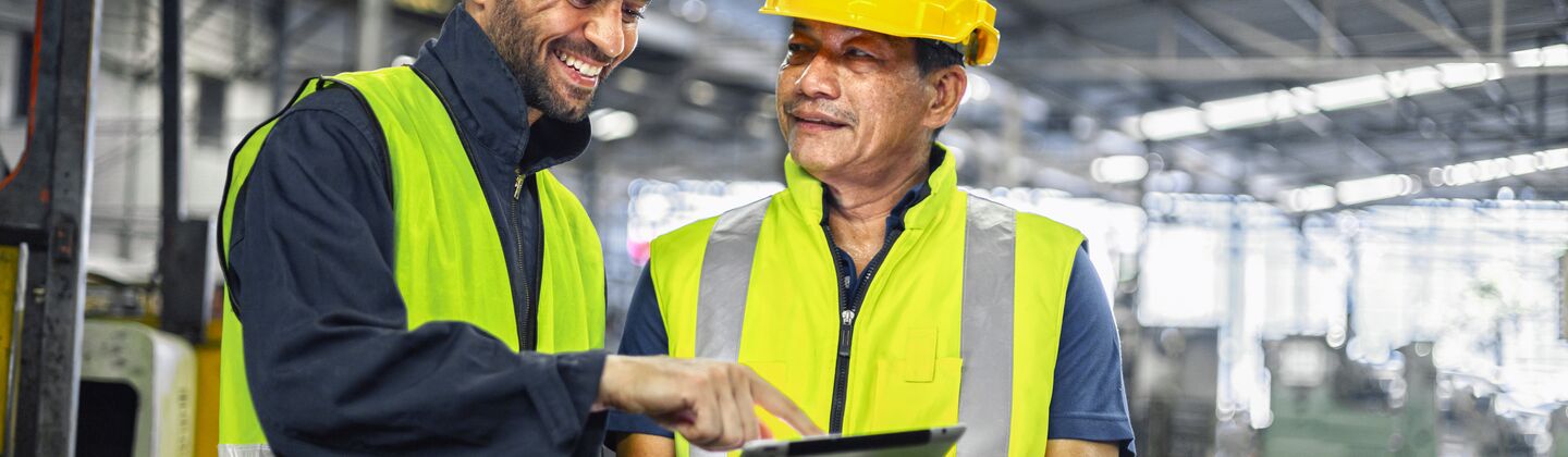 COLOUR-IMAGE_Male-two-engineer-tablet-factory_july26