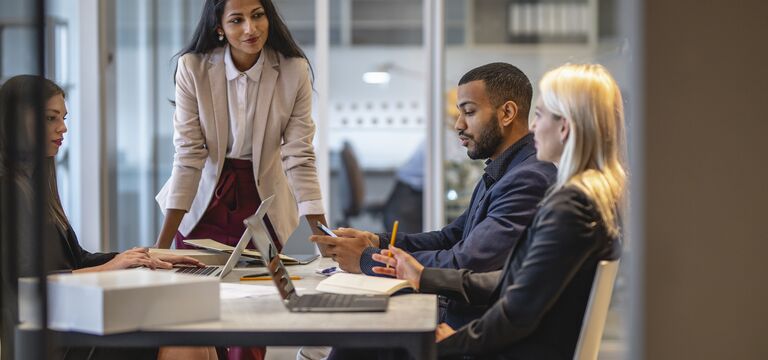 /bynder-asset/bynder:923B9B86-5DA2-40EA-B96F005A7424E5E6/Landscape_MD/COLOUR-IMAGE_four-professionals-in-business-meeting_jul26.jpg?1782917091000