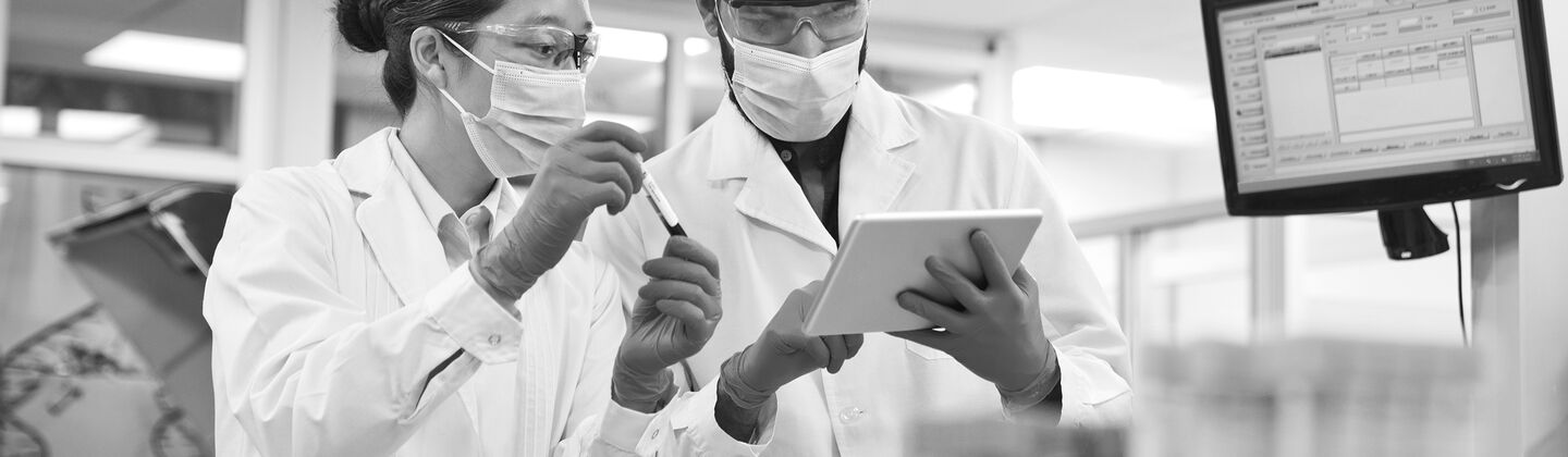 SINGLE-IMAGE_discussing-over-digital-tablet-at-laboratory_mar25