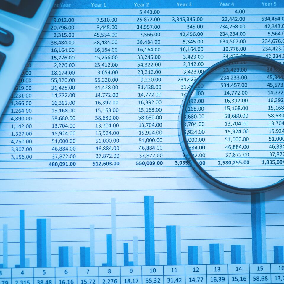 COLOUR-IMAGE_calculator-magnifying-glass-paper_feb26
