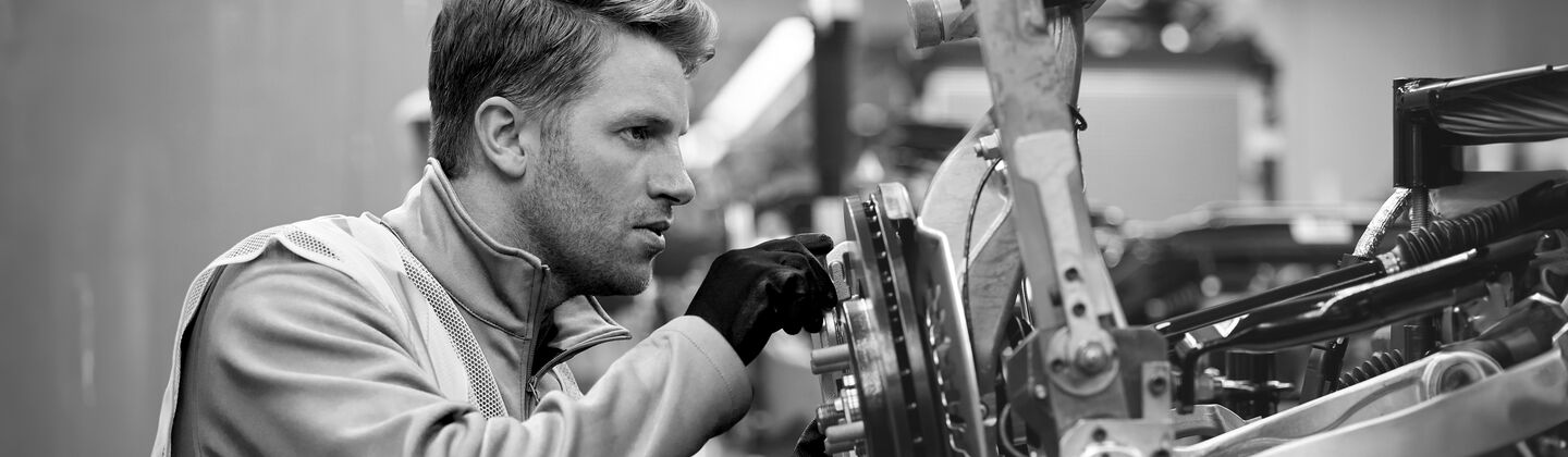 SINGLE-IMAGE_mechanic-calibrating-machine_sept24