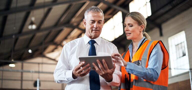 /bynder-asset/bynder:BE3980A8-1407-41A0-92422CEA4AB1DF46/Landscape_MD/COLOUR-IMAGE_two-colleagues-speaking-over-a-tablet_apr26.jpg?1776243913000