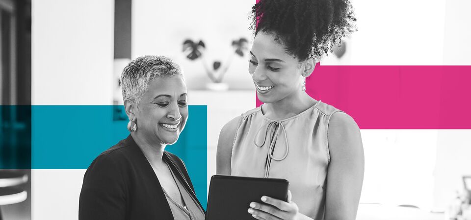 SINGLE-IMAGE_squares-business-womens-standing-in-office-with-a-tablet_may24