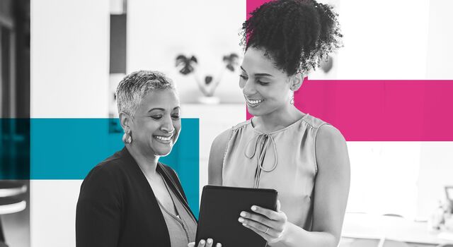 SINGLE-IMAGE_squares-business-womens-standing-in-office-with-a-tablet_may24