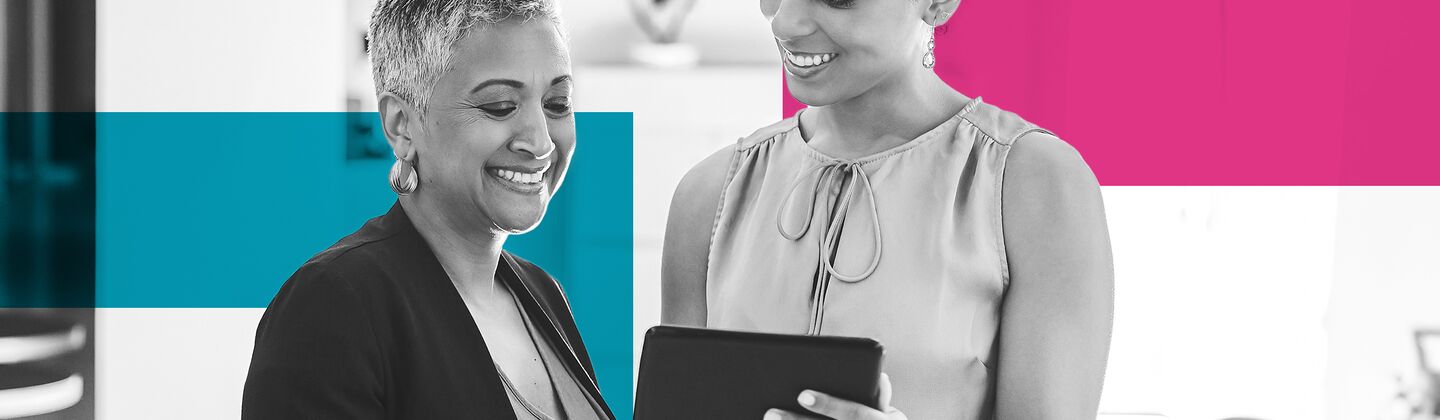 SINGLE-IMAGE_squares-business-womens-standing-in-office-with-a-tablet_may24