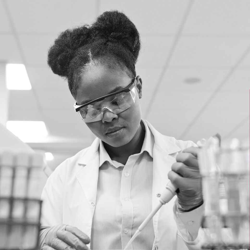 SINGLE-IMAGE_squares-young-female-scientist-filling-chemical-through-pipette_mar25