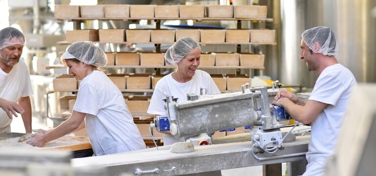 /bynder-asset/bynder:CE296328-928F-4236-A10C88BEAA0F3012/Landscape_MD/COLOUR-IMAGE_Workers_large_bakery_Oct26.jpg?1793120990000