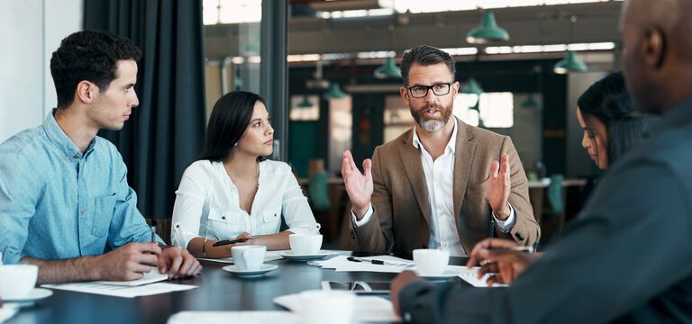 /bynder-asset/bynder:EB445EAA-5862-40BD-93E777A7DC850962/Landscape_MD/COLOUR-IMAGE_man-speaking-to-group-in-meeting_jul26.jpg?1782917094000