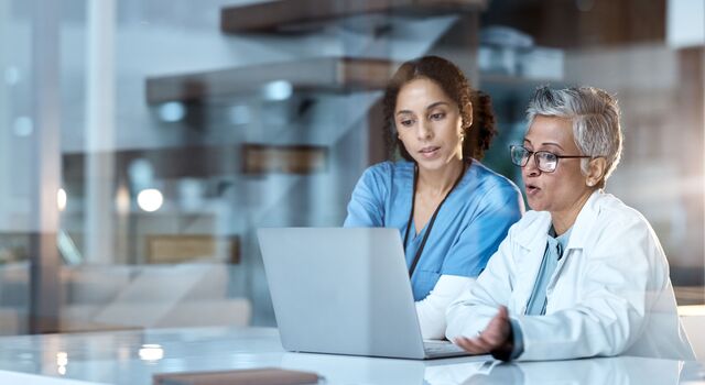 COLOUR-IMAGE_healthcare-laptop-computer-coat-screen_feb26