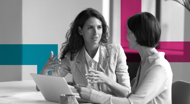 SINGLE-IMAGE_squares-two-business-women-sit-at-desk-laptop_jul24
