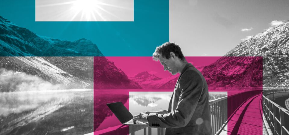 SINGLE-IMAGE_squares-man-with-laptop-by-mountain-lake_jun24