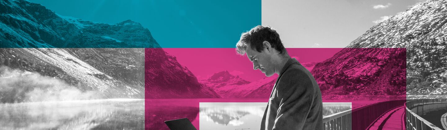 SINGLE-IMAGE_squares-man-with-laptop-by-mountain-lake_jun24