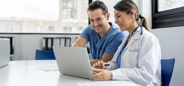 /bynder-asset/bynder:F55EEAC8-83FC-4EB9-9034967F1FEE5DD7/Landscape_MD/COLOUR-IMAGE_two-dcotors-looking-at-laptop_jul26.jpg?1784198264000