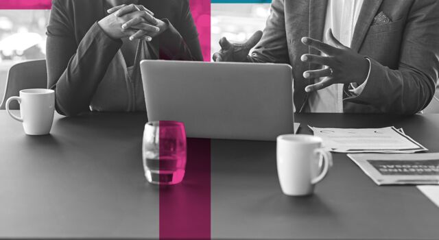 SINGLE-IMAGE_squares-man-&-woman-discussing-laptop_sept23